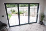 Bifold doors with a view of the garden for a home in Wiltshire.