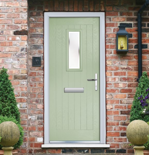 A light green upvc composite door.