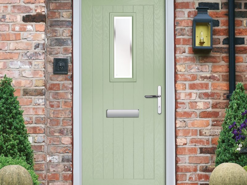 A light green upvc composite door.