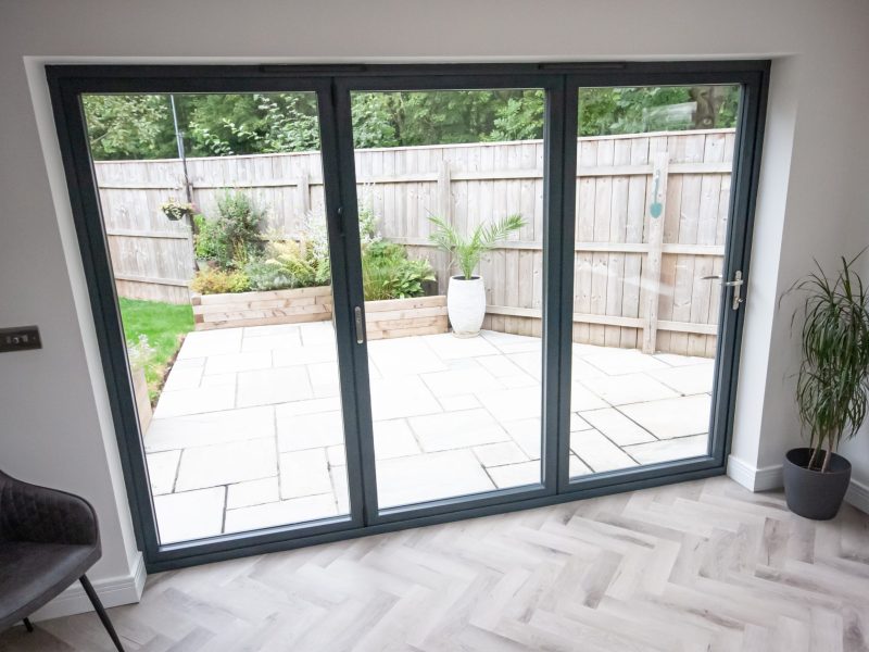 Grey aluminium bifold doors for a home in Swindon.