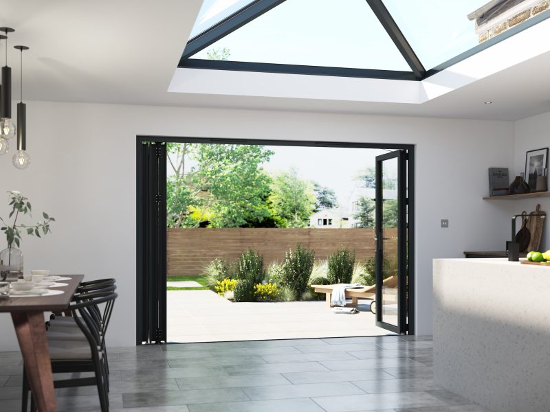 An opened Korniche aluminium bifold doors in Wiltshire.