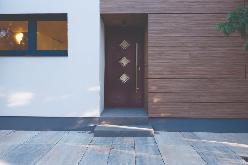 A red Galactic composite front door for a home in Wiltshire.